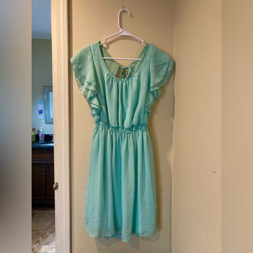 Maurice’s medium teal/light blue dress, good condition.
